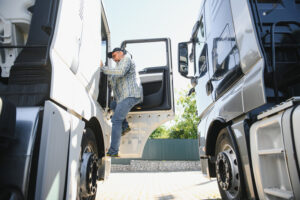 Truck Driver Getting into Truck